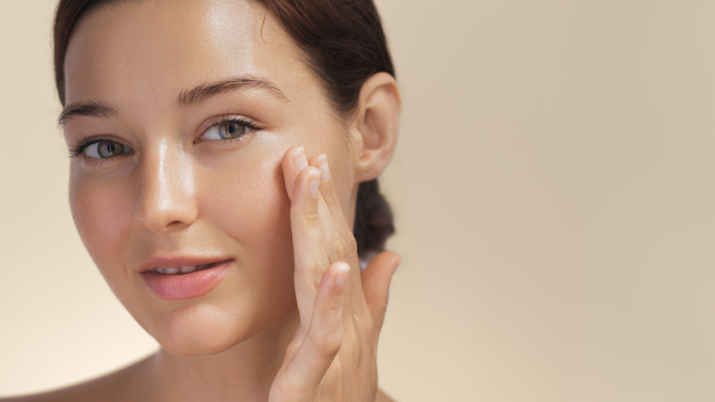 Woman with dewy glowing skin smile
